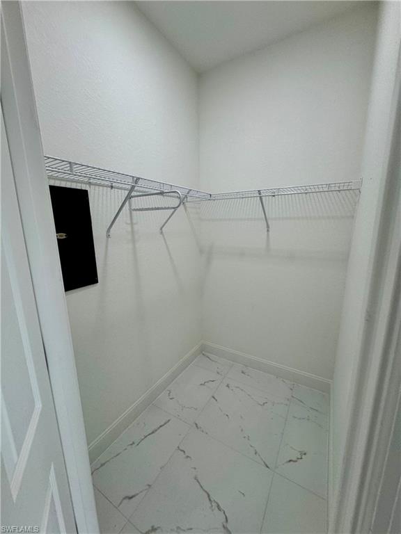 3743 Kenyon Street Fort Myers, FL 33905 - Photo 11 of 18 a view of a room with racks on the wall