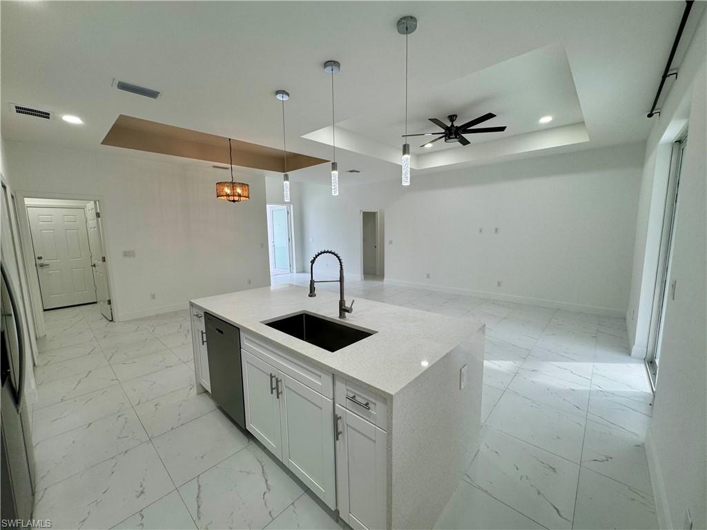 3743 Kenyon Street Fort Myers, FL 33905 - Photo 5 of 18 a view of a bathroom with a sink and mirror