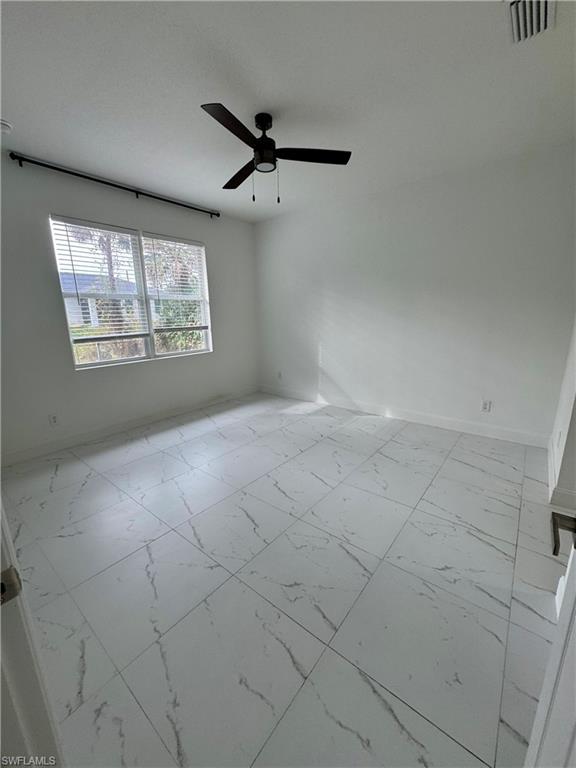 3743 Kenyon Street Fort Myers, FL 33905 - Photo 7 of 18 a view of an empty room with a window