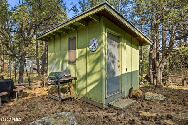 a view of a yard with an outdoor seating