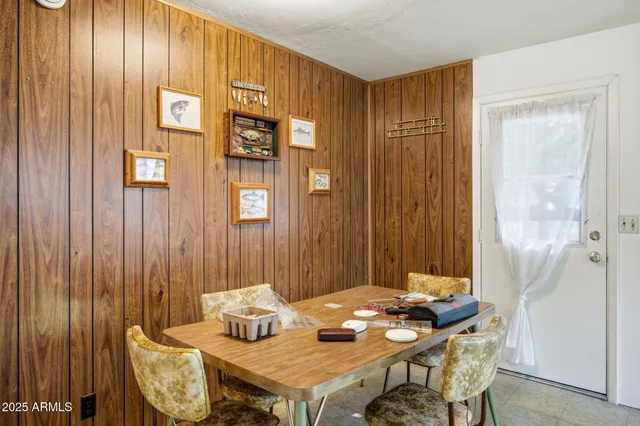 a kitchen with a sink cabinets and window