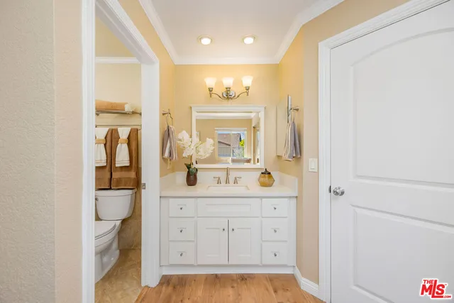 a bathroom with a shower and a toilet