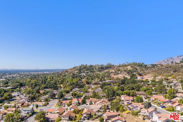 a view of mountains and valleys