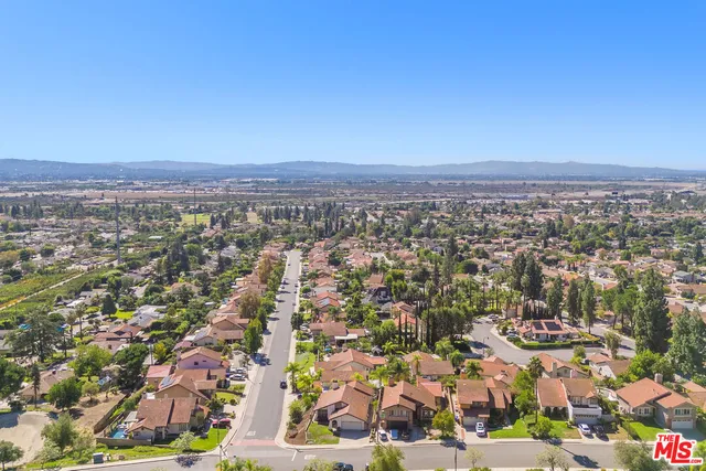 a view of a city with an ocean view
