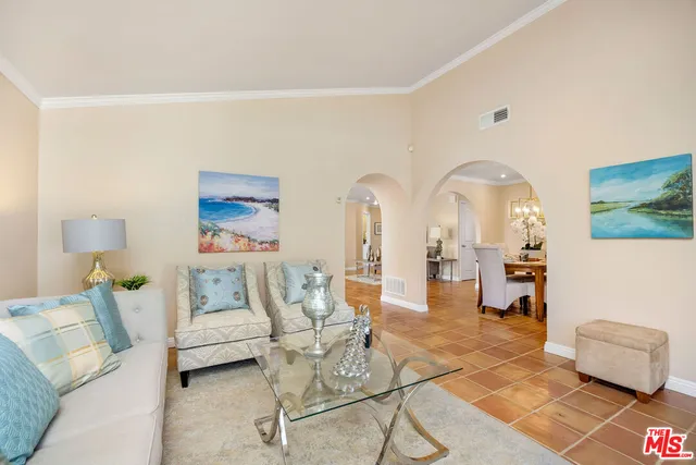 a living room with furniture and a couch