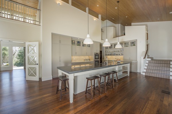 150 Meadowbrook Road Weston, MA 02493 - Photo 5 of 27 a kitchen with stainless steel appliances a dining table chairs and wooden floor