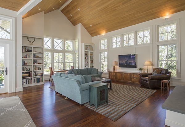 150 Meadowbrook Road Weston, MA 02493 - Photo 9 of 27 a living room with furniture wooden floor and a large window