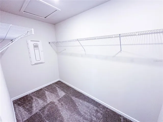 a view of a room with racks on the wall