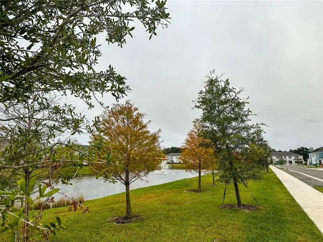 a view of yard with swimming pool