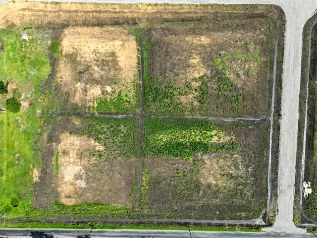 a view of a yard from a balcony