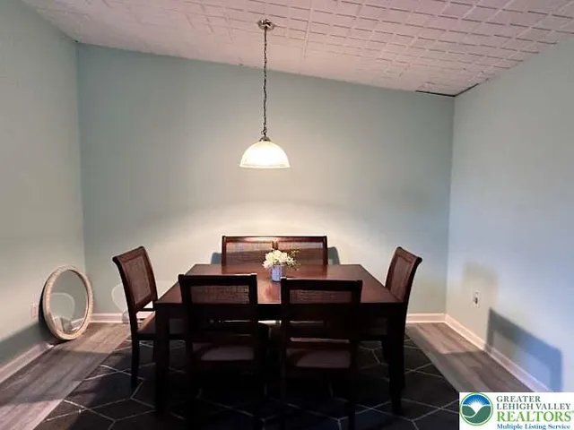a view of a dining room with furniture