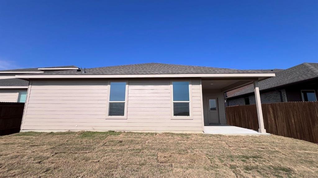 138 Stanton Avenue Rhome, TX 76078 - Photo 18 of 19 a backyard of a house