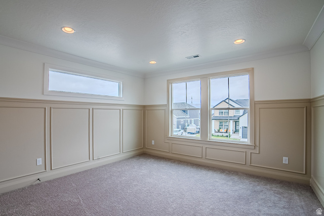 223 South Cottonwood Road, Unit 7501 Vineyard, UT 84059 - Photo 14 of 45 Interior room featuring wainscoting with decorative trim, multiple windows including a transom window, recessed lighting, and carpeted flooring