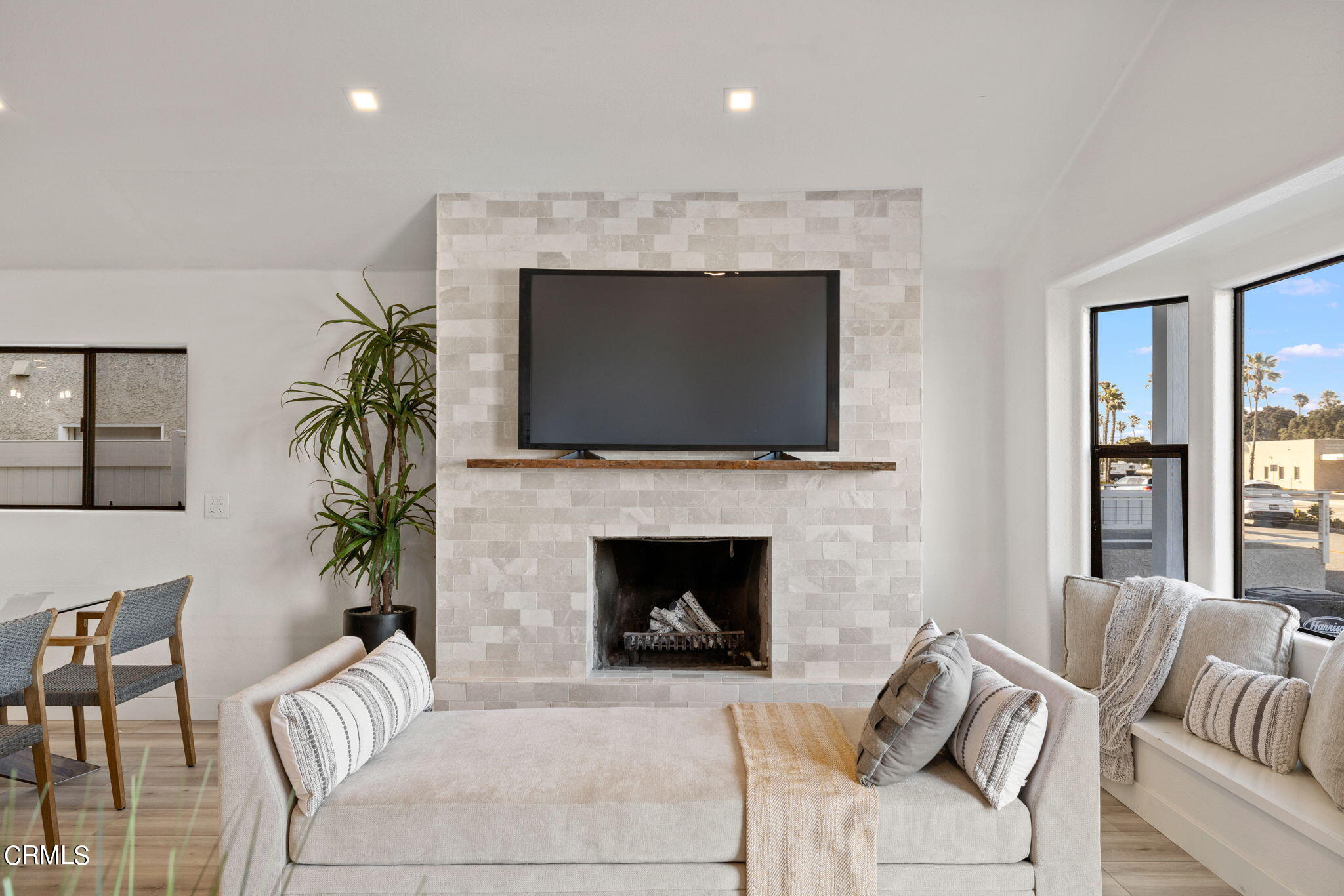 3421 Sunset Lane Oxnard, CA 93035 - Photo 15 of 59 a living room with furniture a fireplace and a flat screen tv