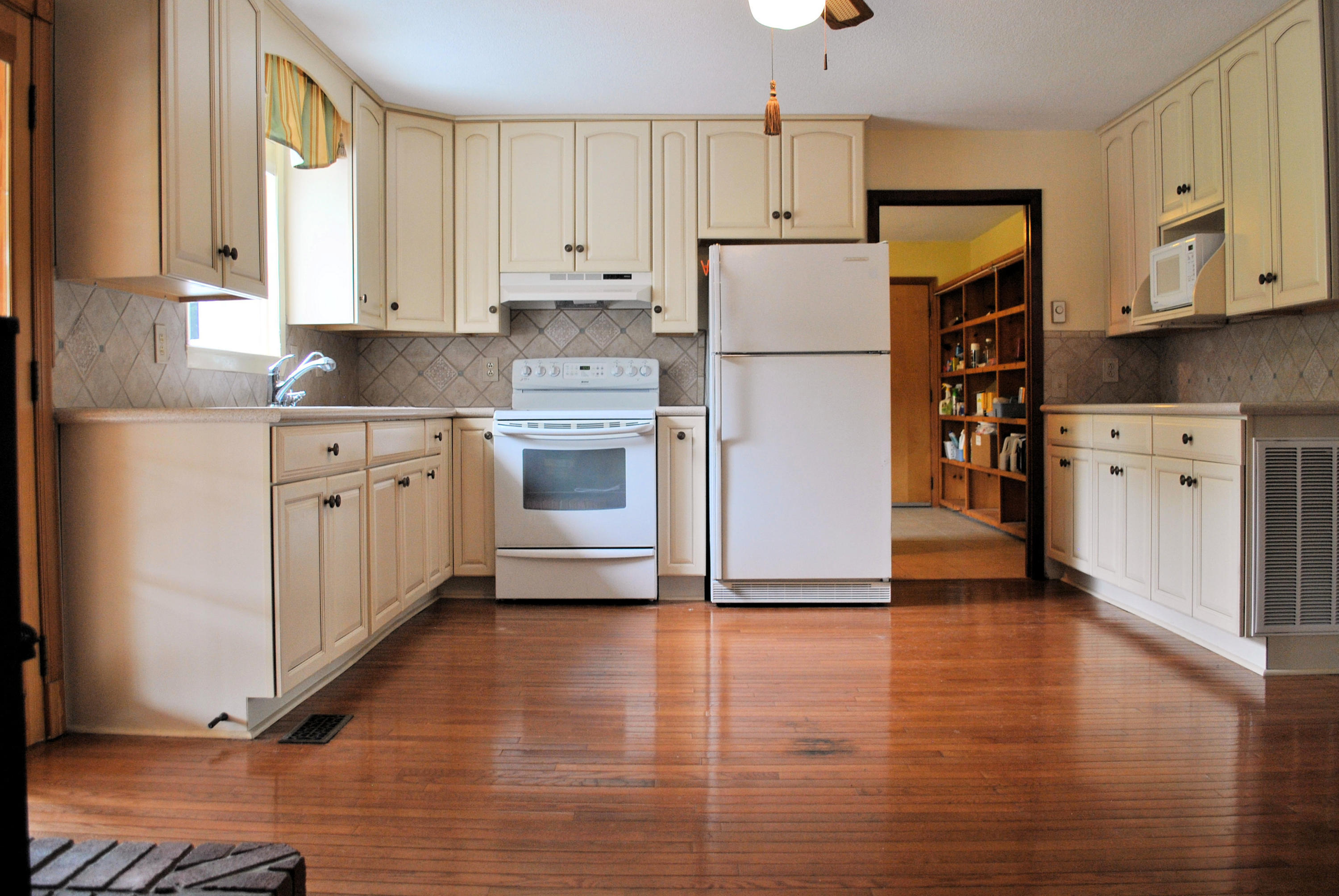 240 Fawn Lane Riner, VA 24149 - Photo 12 of 95 a kitchen with stainless steel appliances a refrigerator sink and cabinets