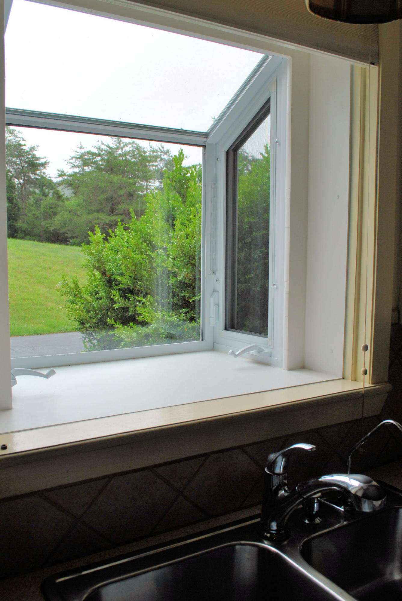 240 Fawn Lane Riner, VA 24149 - Photo 14 of 95 Greenhouse Window In Kitchen