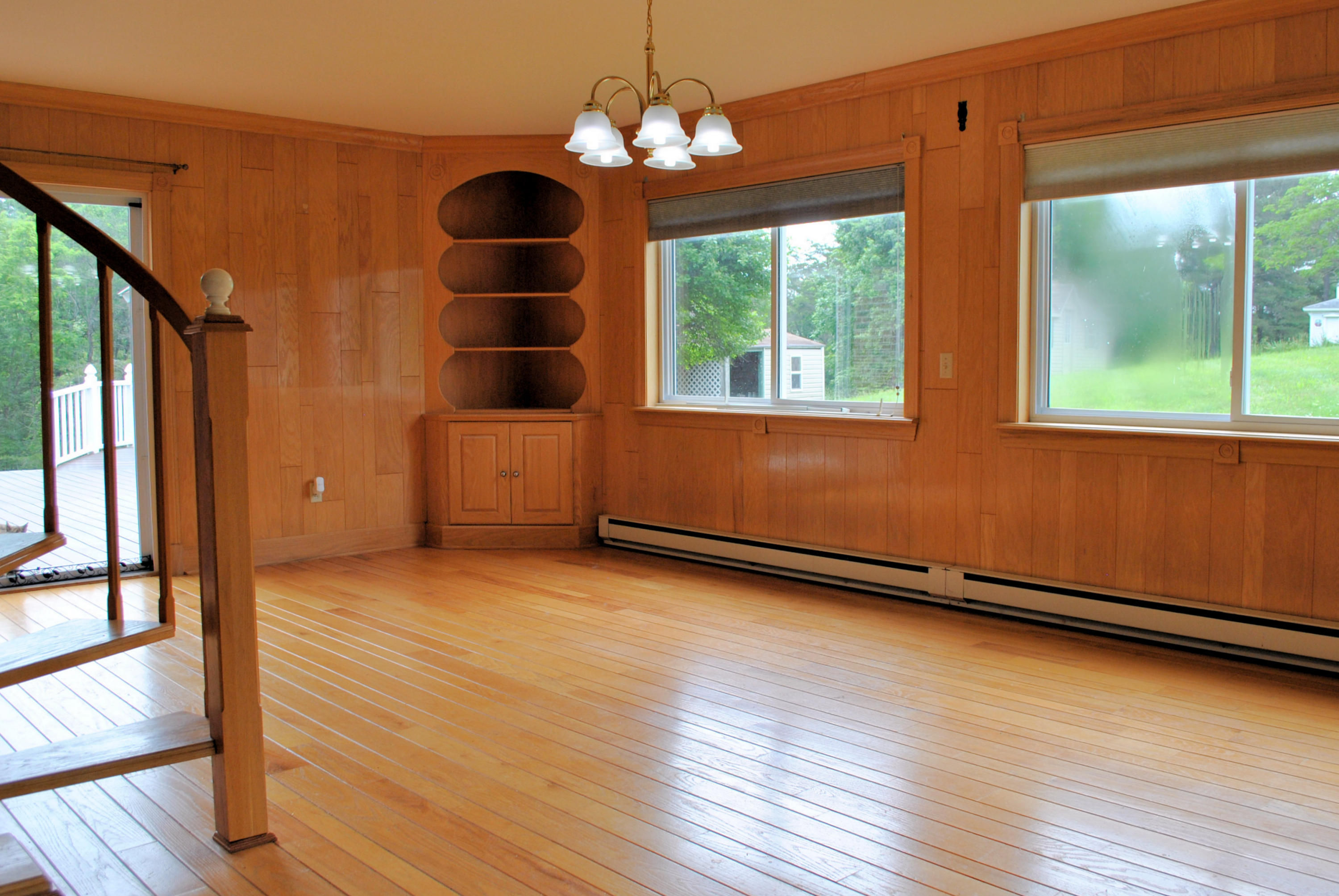 240 Fawn Lane Riner, VA 24149 - Photo 21 of 95 an empty room with wooden floor and windows