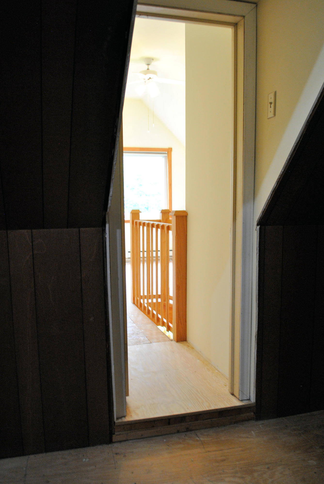 240 Fawn Lane Riner, VA 24149 - Photo 44 of 95 a view of an empty room with wooden floor and a window