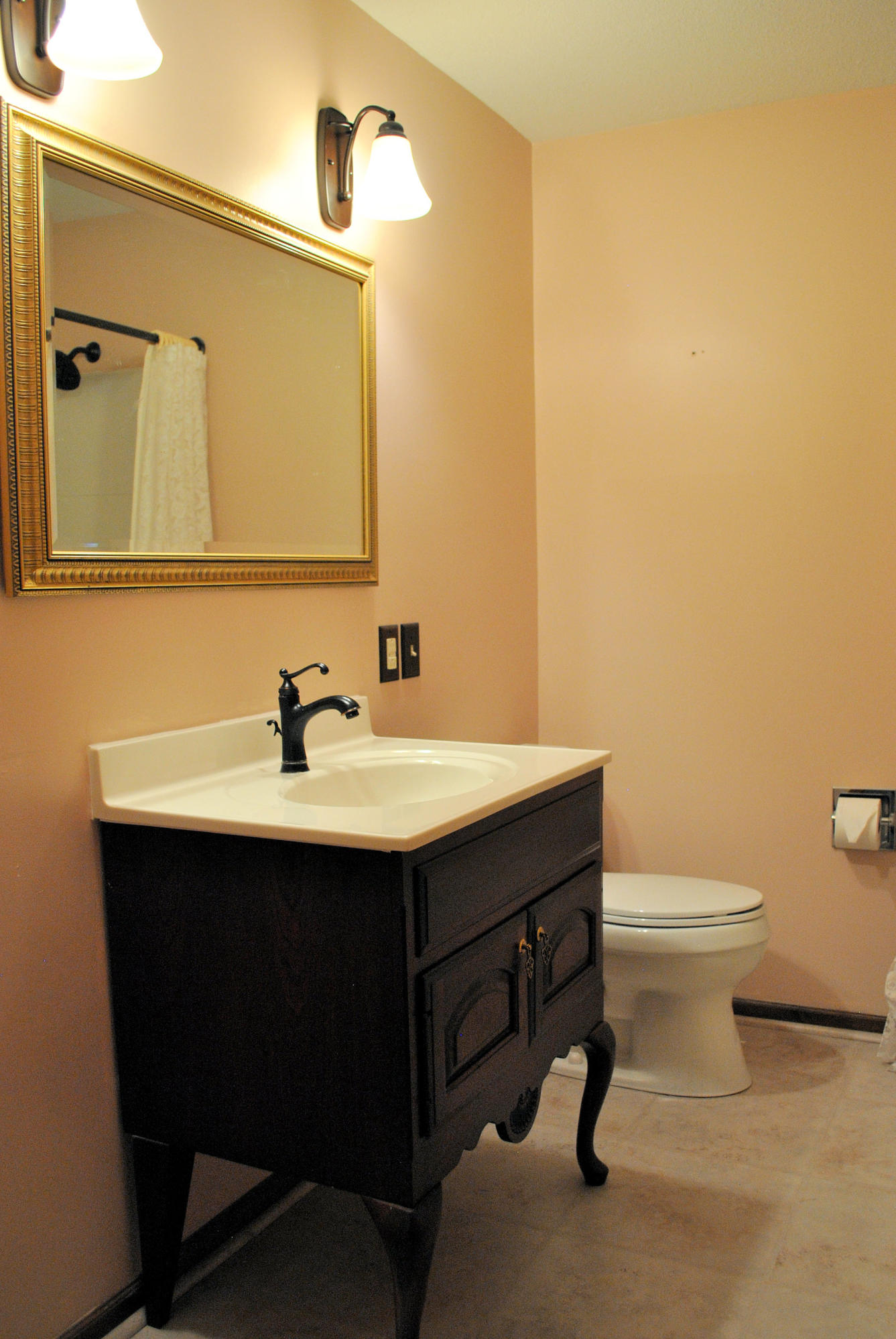 240 Fawn Lane Riner, VA 24149 - Photo 58 of 95 a bathroom with a sink mirror vanity and toilet