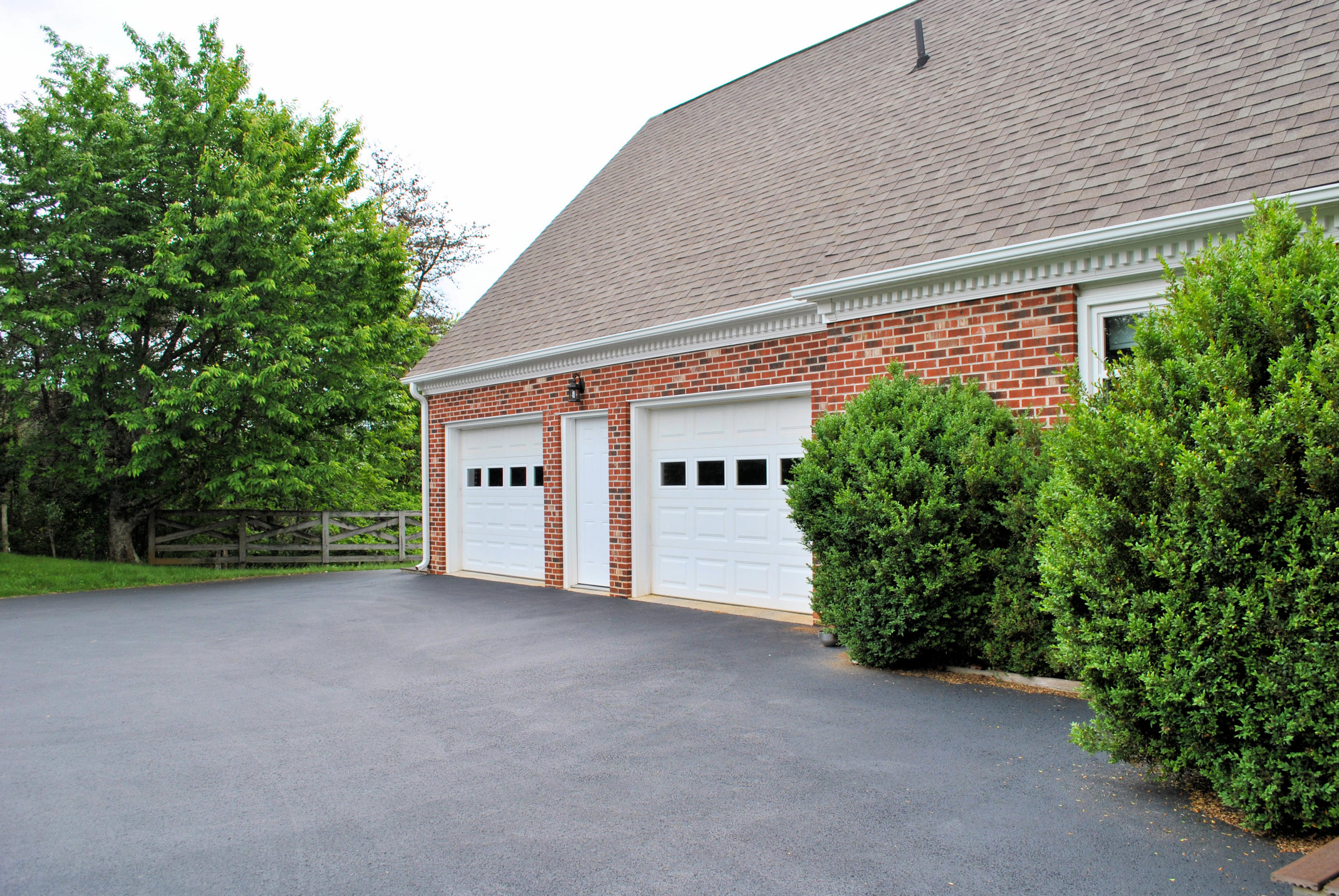 240 Fawn Lane Riner, VA 24149 - Photo 76 of 95 a view of a house with a backyard and garage