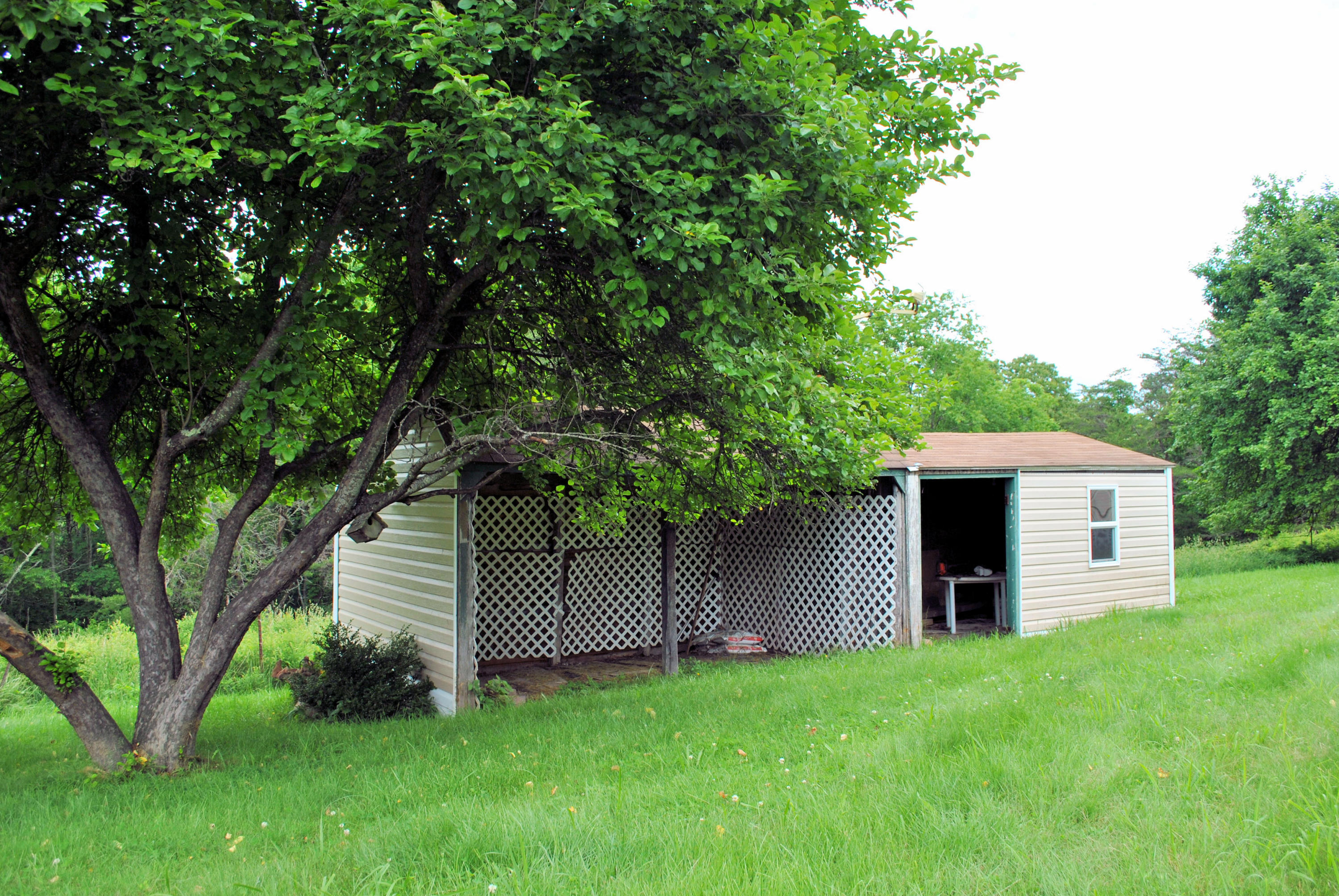 240 Fawn Lane Riner, VA 24149 - Photo 81 of 95 a front view of a house with a garden