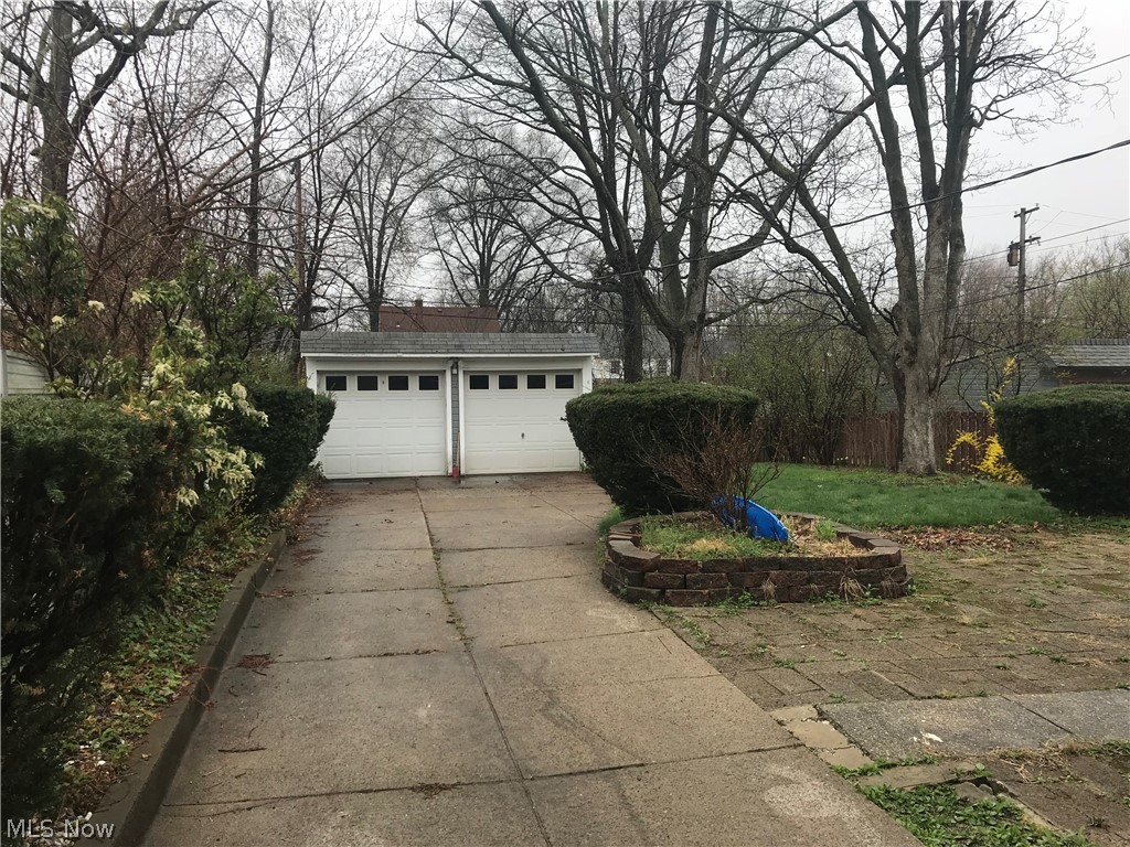 906 Montford Road Cleveland Heights, OH 44121 - Photo 19 of 20 Concrete driveway leads to 2 car garage.