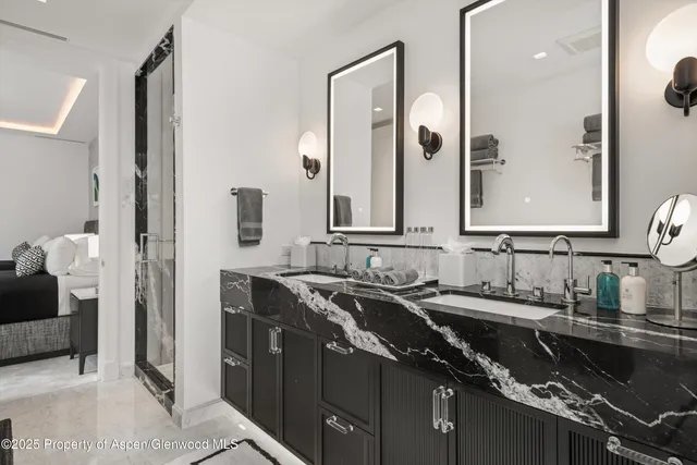 a bedroom with a bed chair and a window