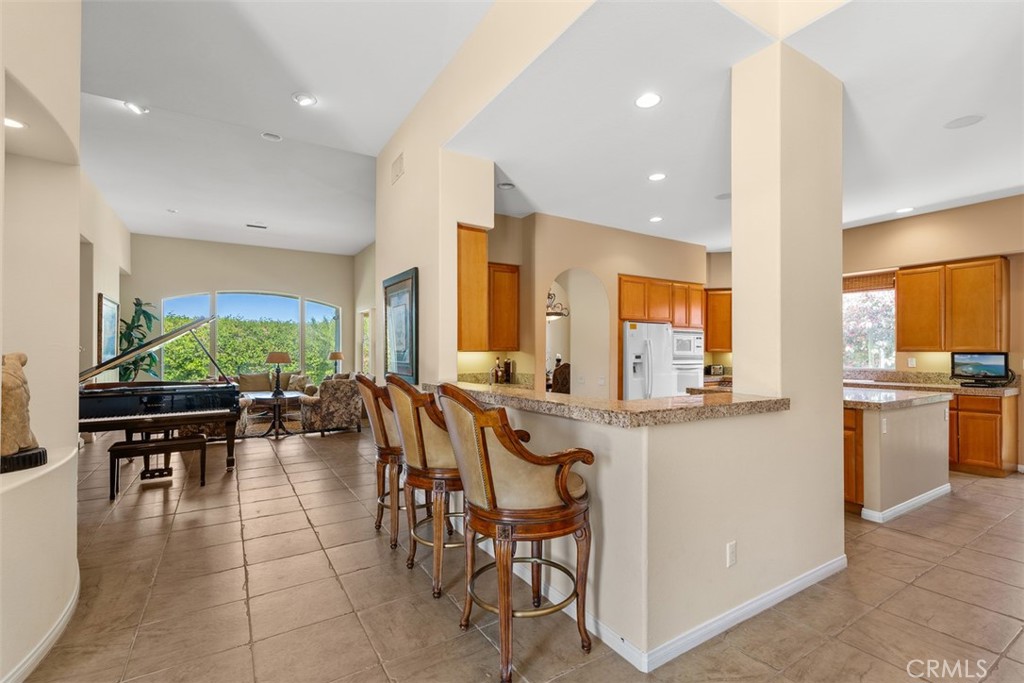 1228 Verdugo Road Palm Springs, CA 92262 - Photo 6 of 25 Another view of kitchen with breakfast bar