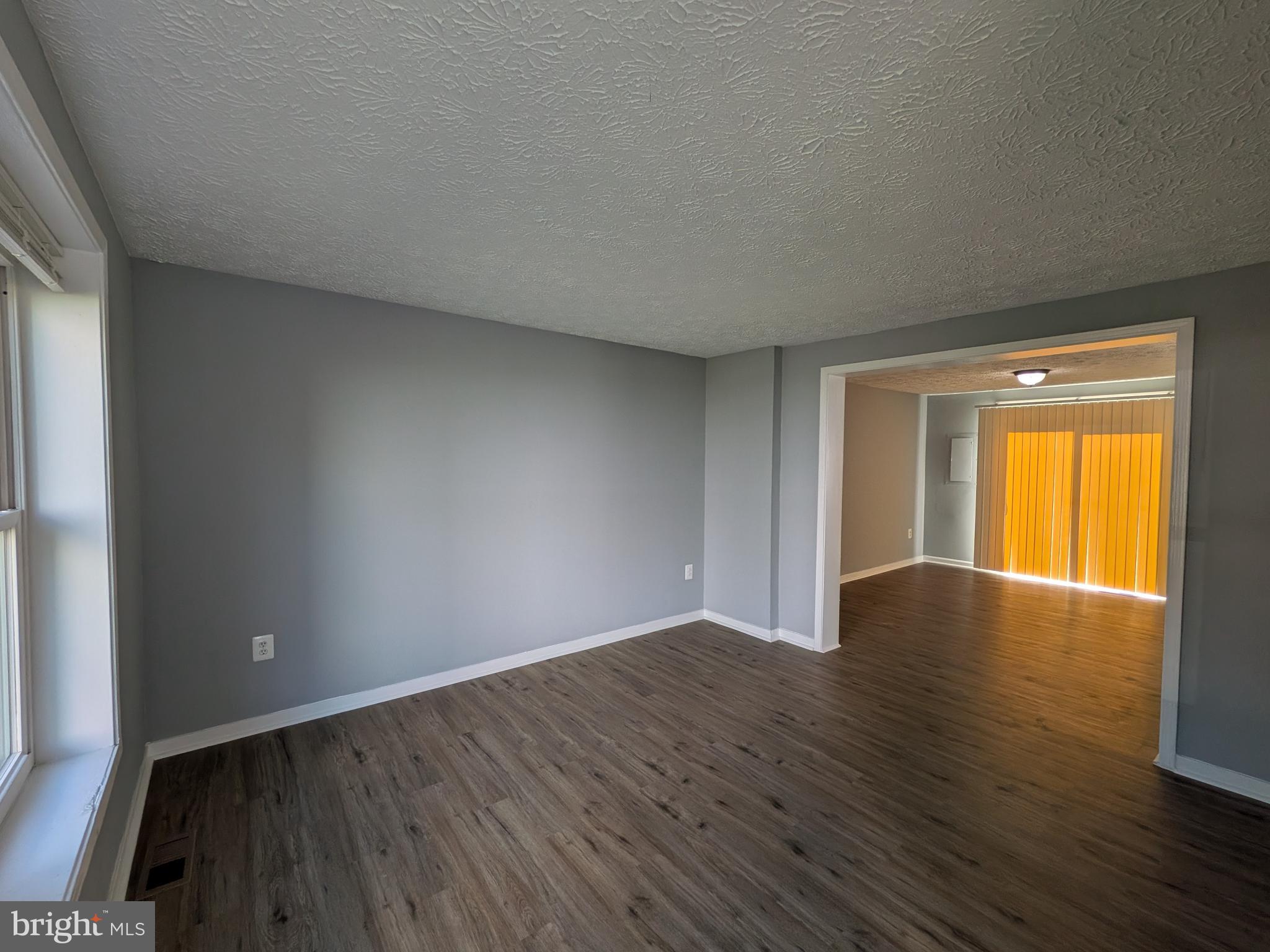 9479 Inaugural Drive King George, VA 22485 - Photo 2 of 5 Living Room Dining Room