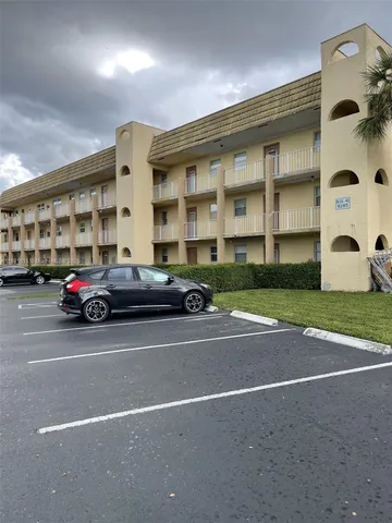 a car parked in front of a building
