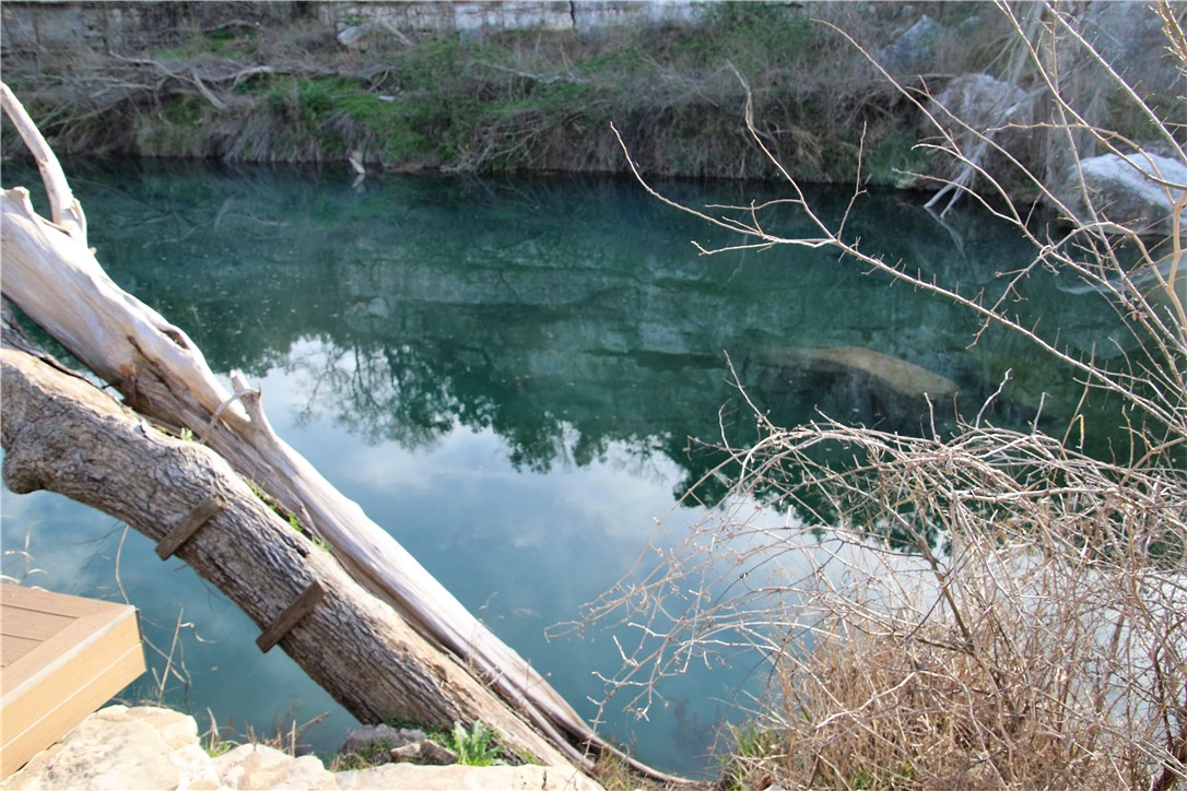a view of a lake from a balcony