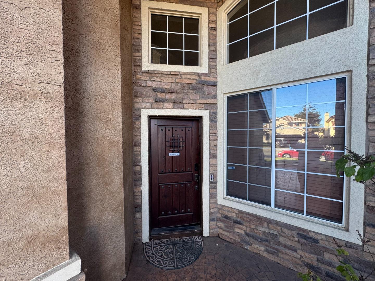 10 Rhine Circle Salinas, CA 93906 - Photo 3 of 50 a view of an empty room with wooden floor and a window