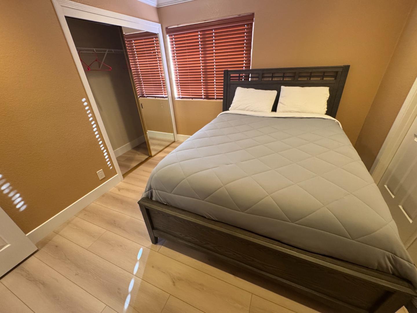 10 Rhine Circle Salinas, CA 93906 - Photo 39 of 50 a bedroom with a bed and a large window