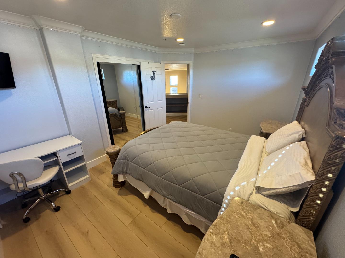 10 Rhine Circle Salinas, CA 93906 - Photo 40 of 50 a bedroom with a bed and a mirror