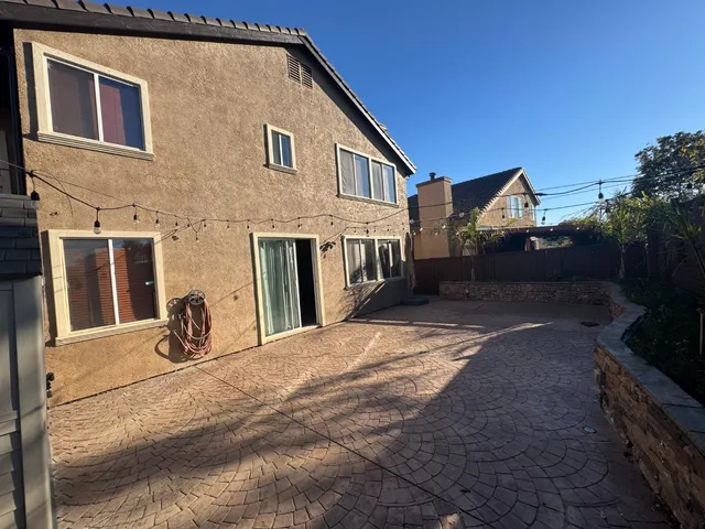 a front view of a house with yard
