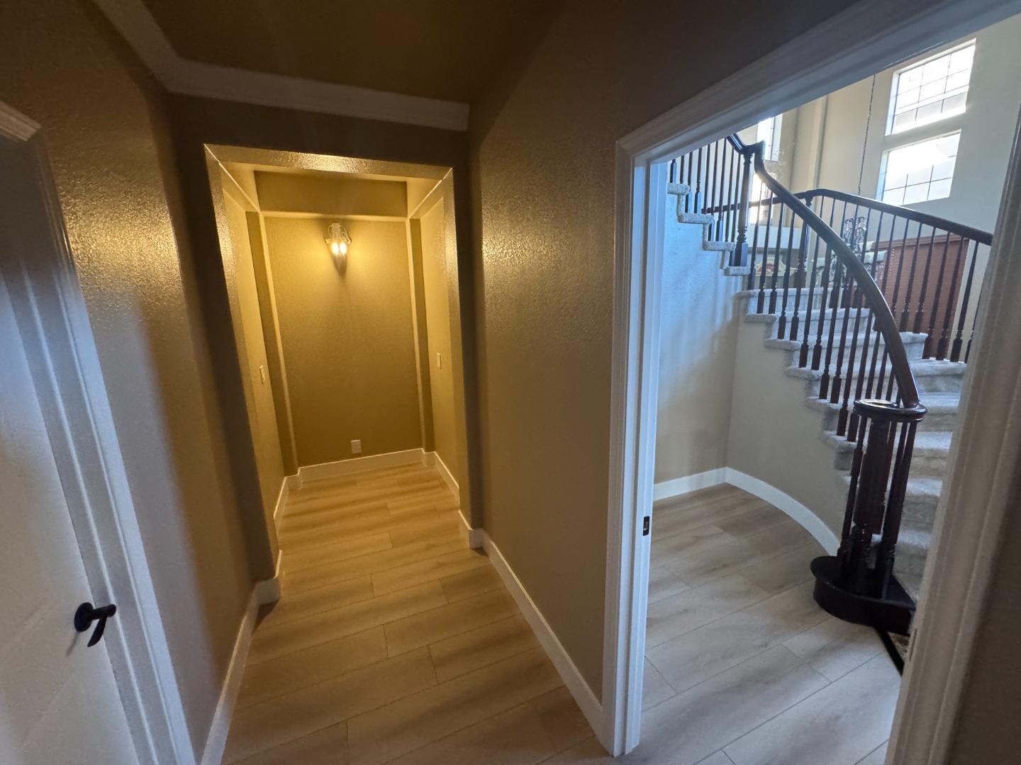 10 Rhine Circle Salinas, CA 93906 - Photo 8 of 50 a view of a hallway with wooden floor and stairs