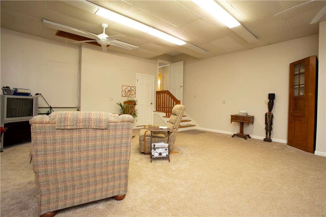 2066 Boston Neck Road North Kingstown, RI 02874 - Photo 14 of 35 This 21' x 22' great room is a blank slate to use in a way that best suits your lifestyle.