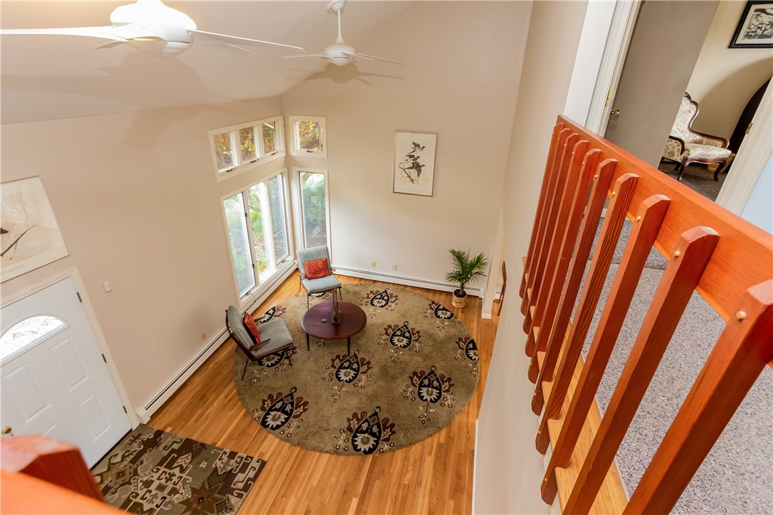 2066 Boston Neck Road North Kingstown, RI 02874 - Photo 16 of 35 Head upstairs to three bedrooms and two full bathrooms.
