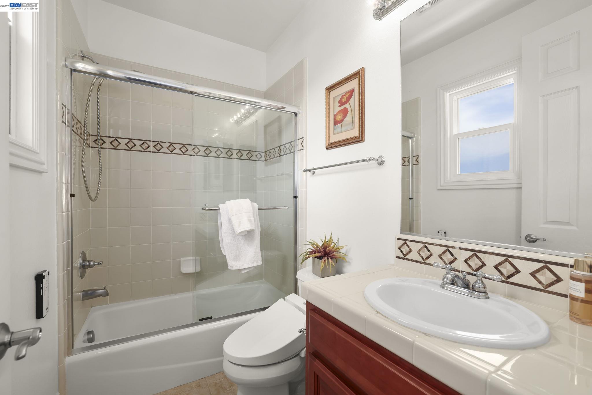 950 Winsford Court San Ramon, CA 94583 - Photo 47 of 68 a bathroom with a sink toilet and shower