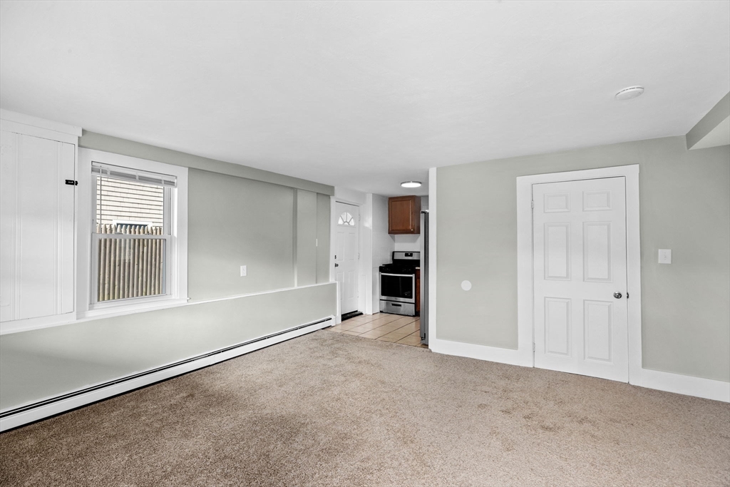 435 Newport Road Hull, MA 02045 - Photo 11 of 35 an empty room with windows and closet