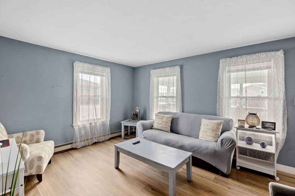 435 Newport Road Hull, MA 02045 - Photo 12 of 35 a living room with furniture and windows