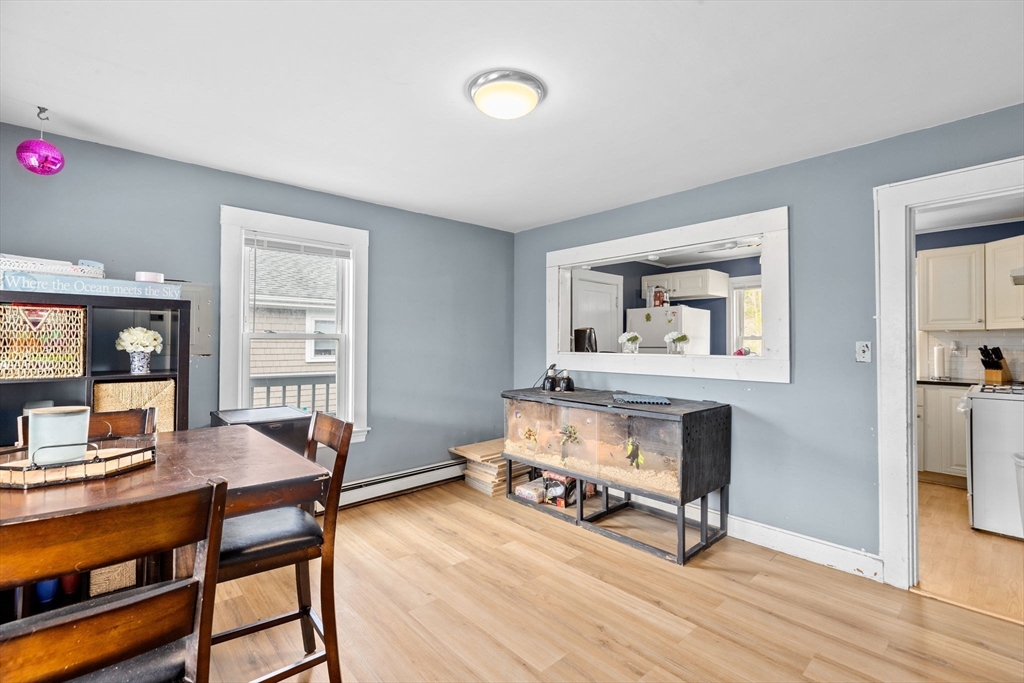 435 Newport Road Hull, MA 02045 - Photo 17 of 35 a work room with furniture and wooden floor
