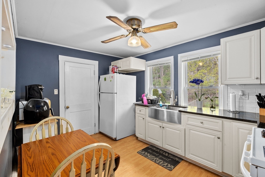 435 Newport Road Hull, MA 02045 - Photo 19 of 35 a bedroom with a bed and a large window