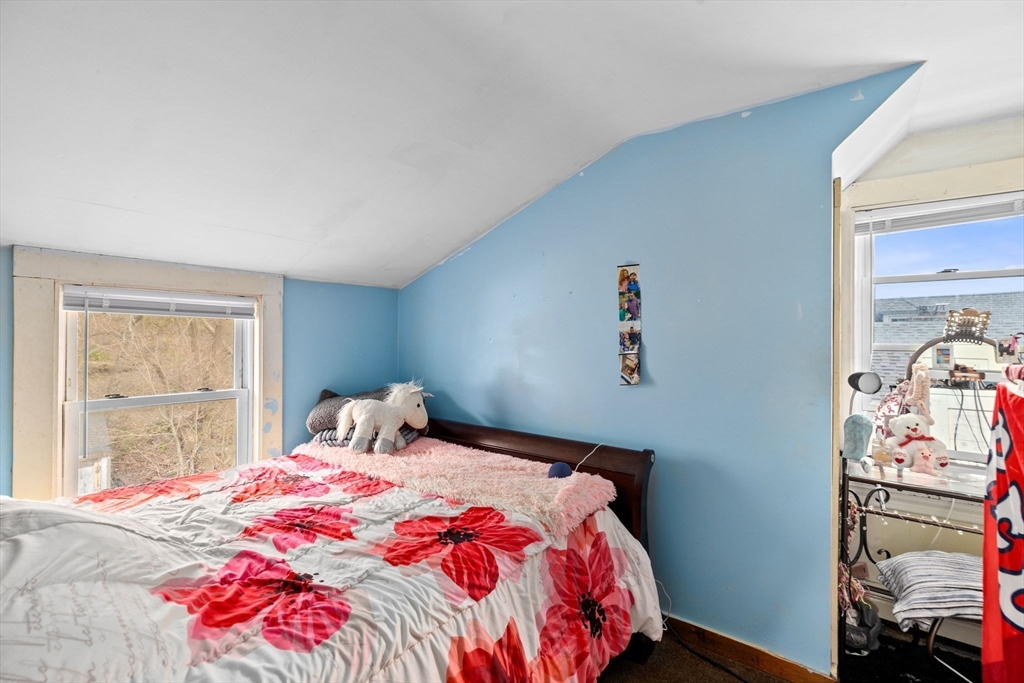 435 Newport Road Hull, MA 02045 - Photo 23 of 35 a bedroom with a bed and a window