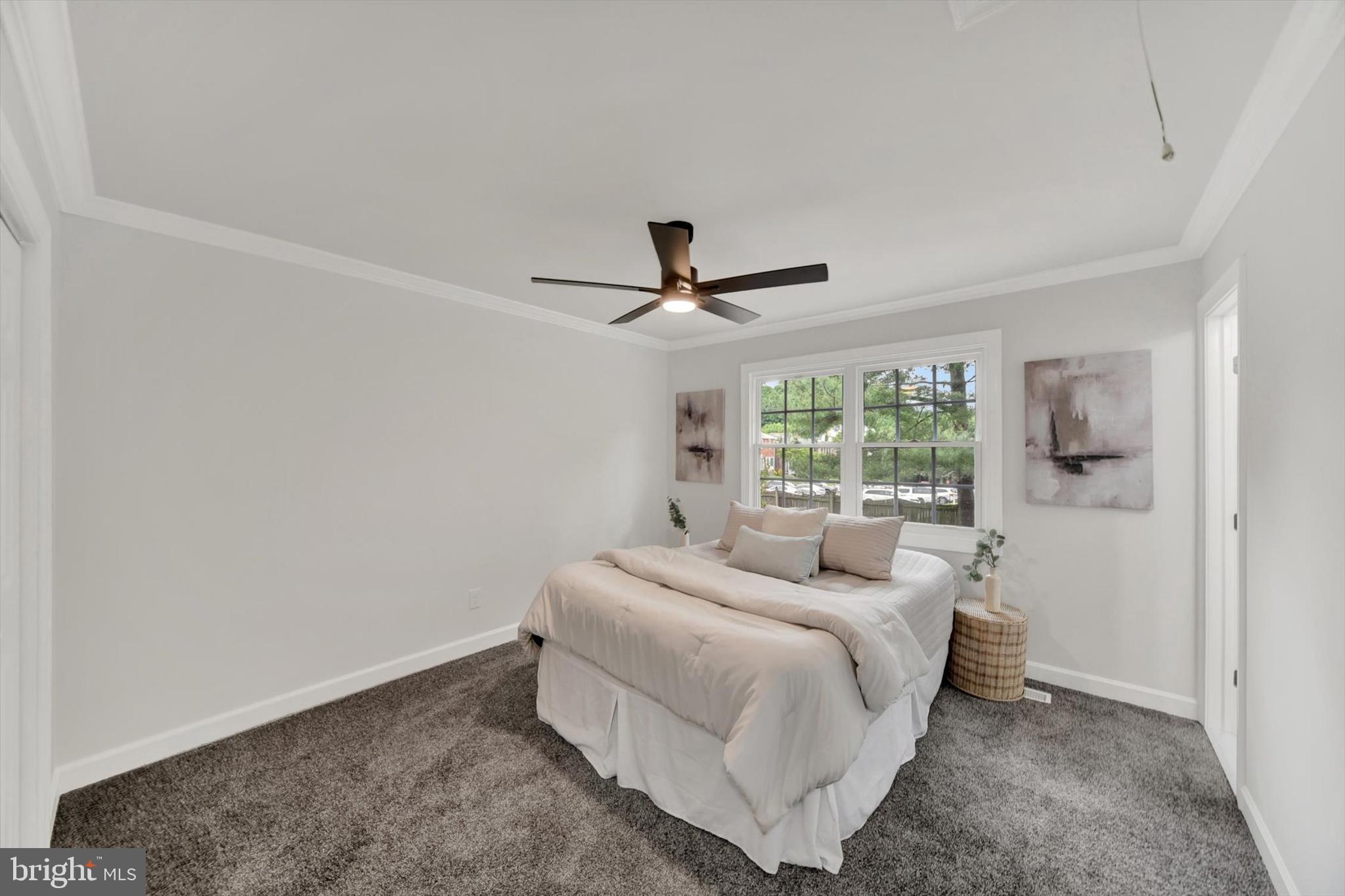 3808 Perryhurst Place Baltimore, MD 21236 - Photo 12 of 29 a bed room with a bed and a window