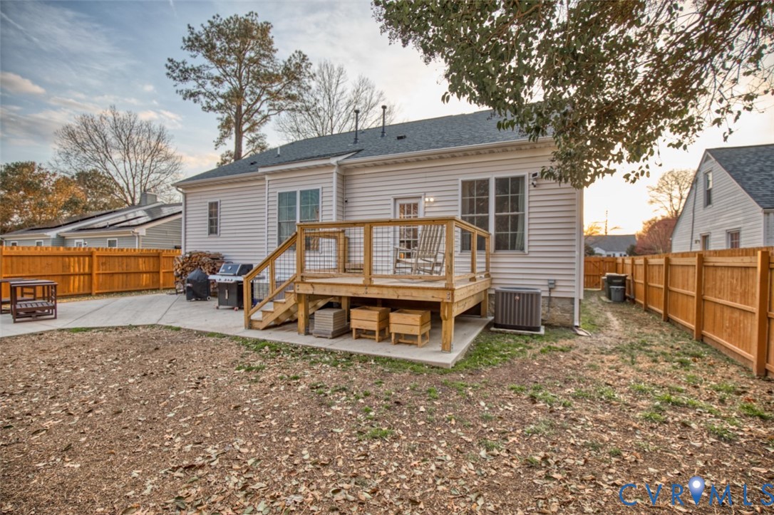 27 Trail Street Hampton, VA 23669 - Photo 16 of 36 a view of a house with a yard and wooden fence