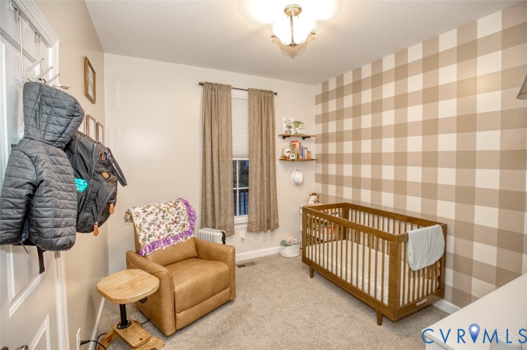 27 Trail Street Hampton, VA 23669 - Photo 25 of 36 a living room with furniture and a rug