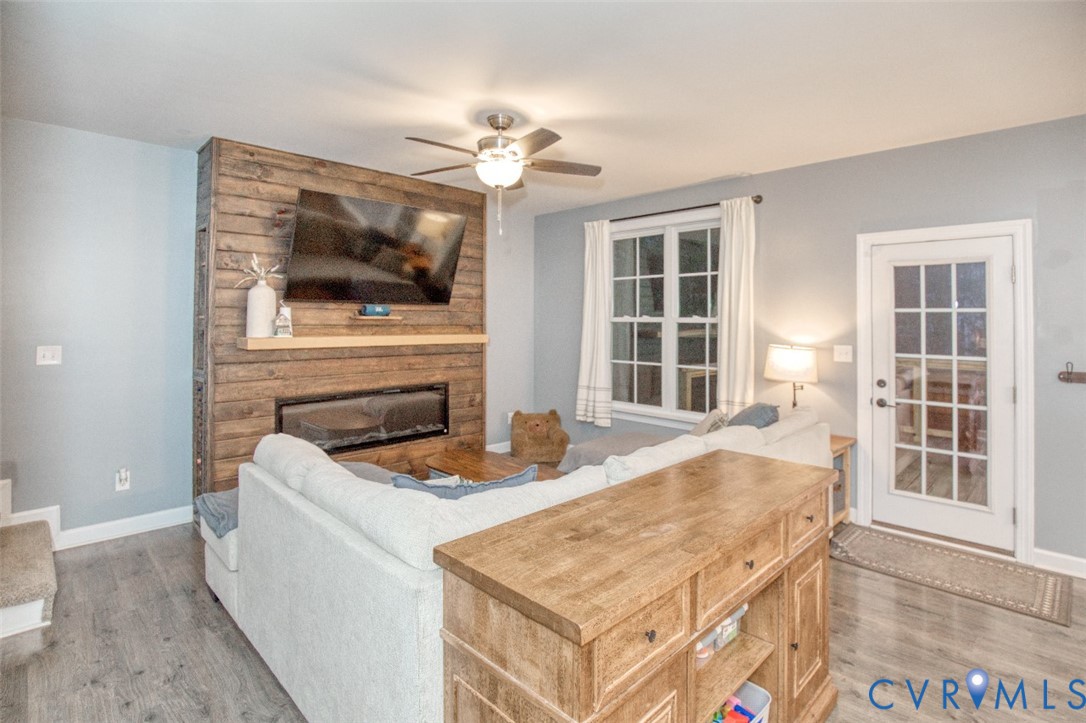 27 Trail Street Hampton, VA 23669 - Photo 10 of 36 a kitchen with a stove a sink and a microwave
