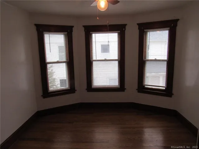 an empty room that has a window