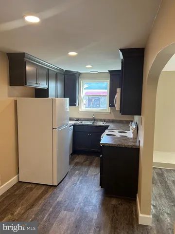 a utility room with washer and dryer